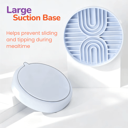 Detailed close-up view of the white Woopsi Nuzzle Duo Bowl, showcasing its large suction base designed to prevent sliding and tipping on smooth surfaces during mealtime.