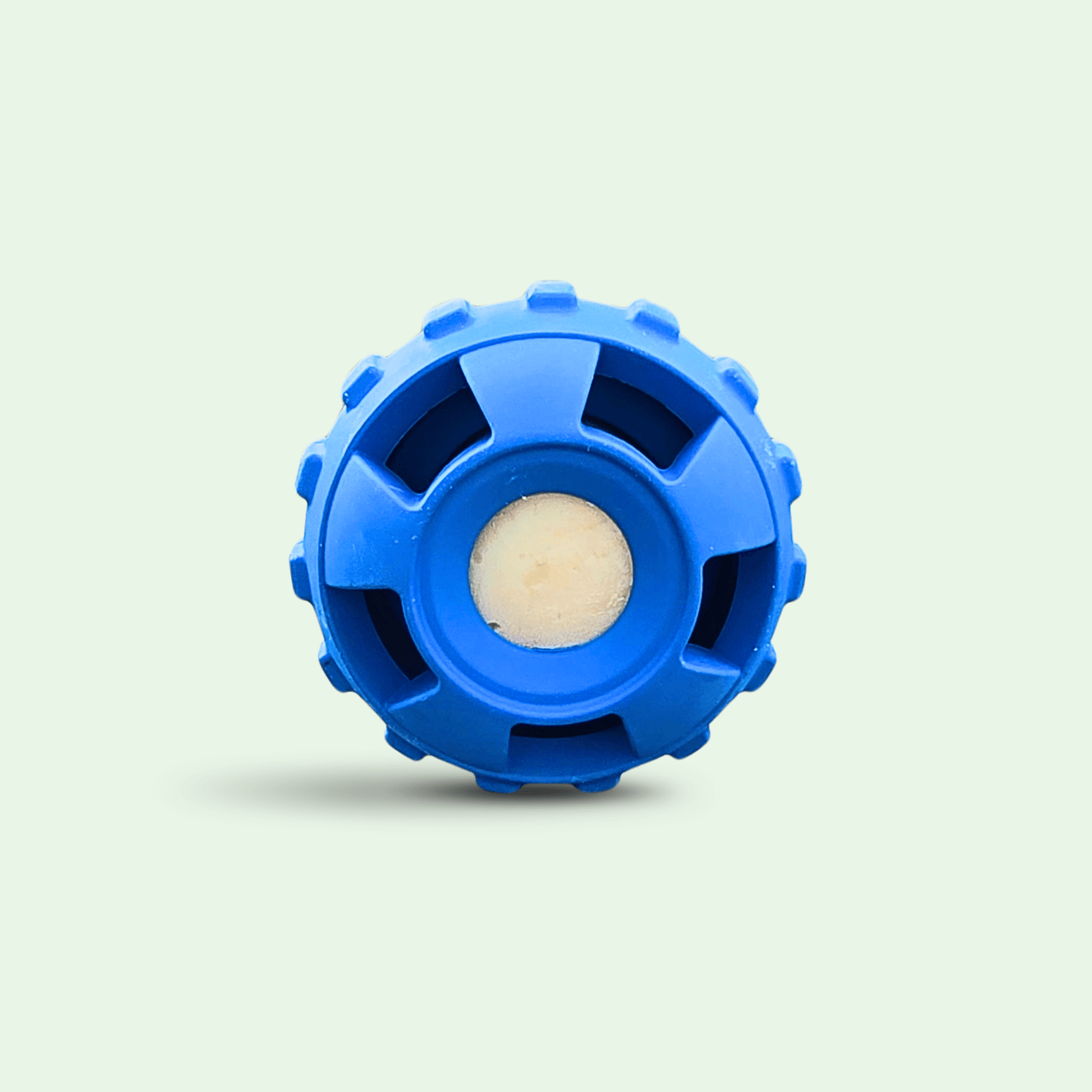 Blue Woopsi ChillBall interactive dog enrichment toy with a frozen treat inside, isolated on a light background.